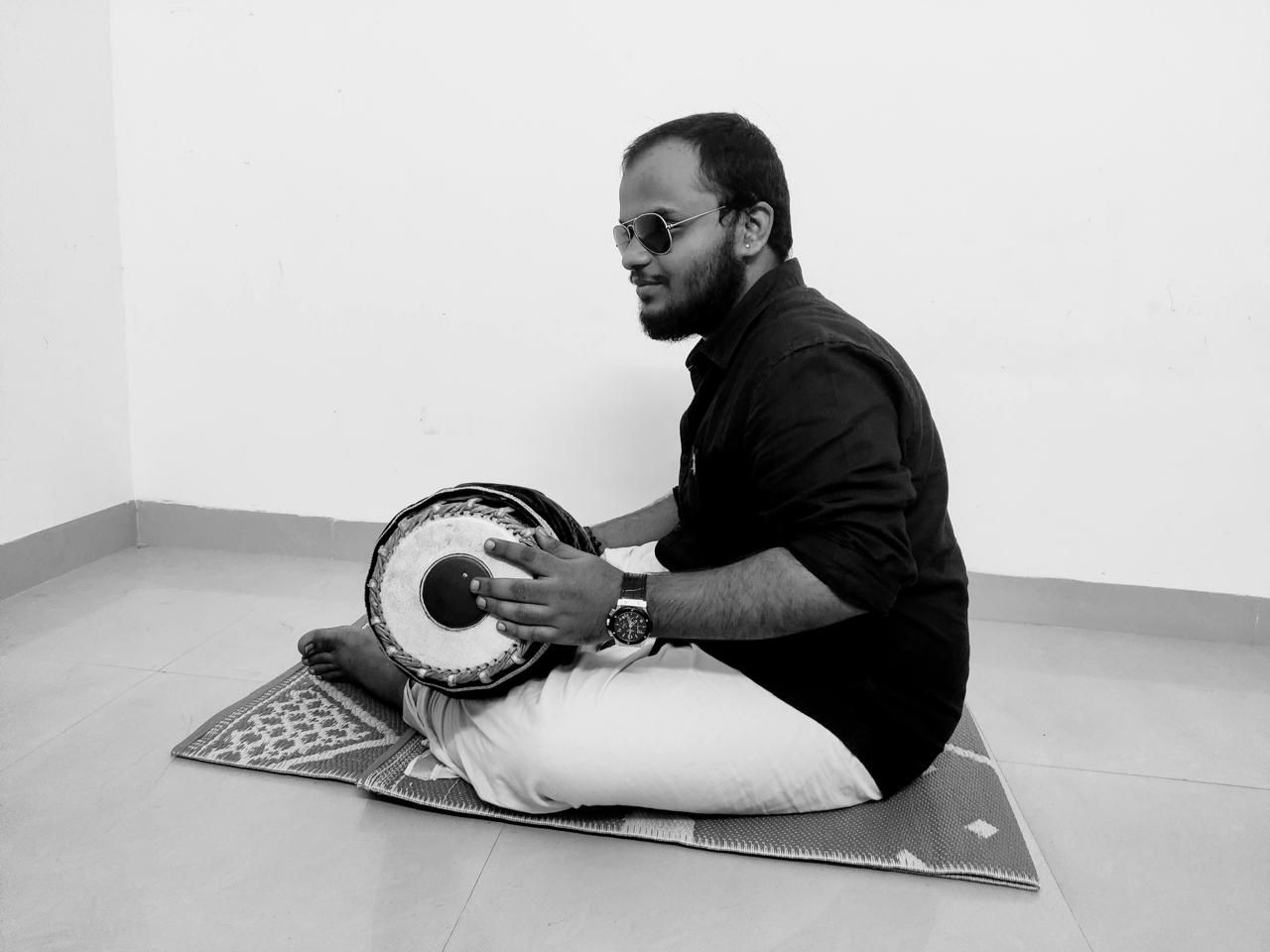Bharath playing mridangam